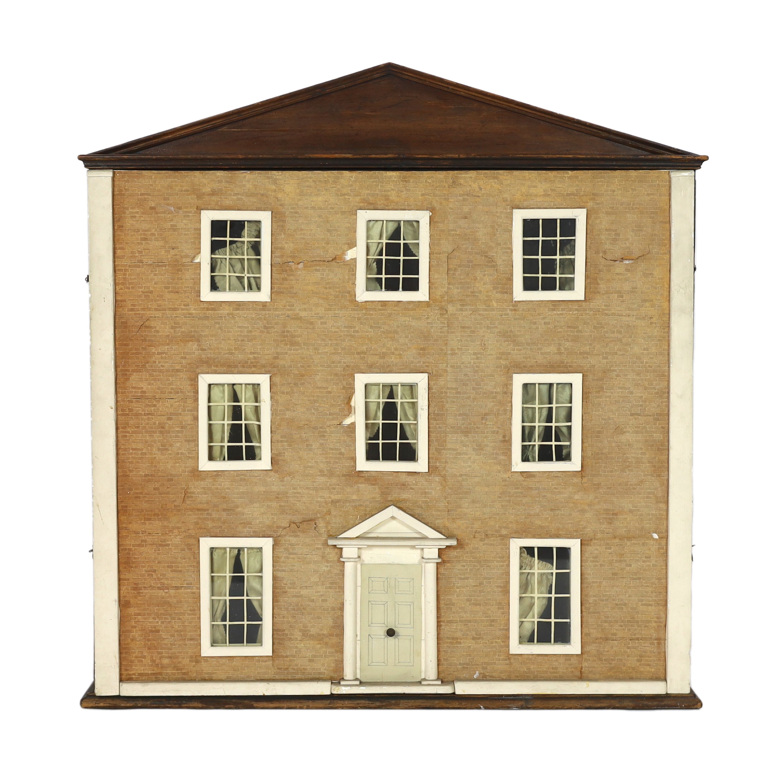 A furnished English dolls’ house, circa 1810-20, 104cm high